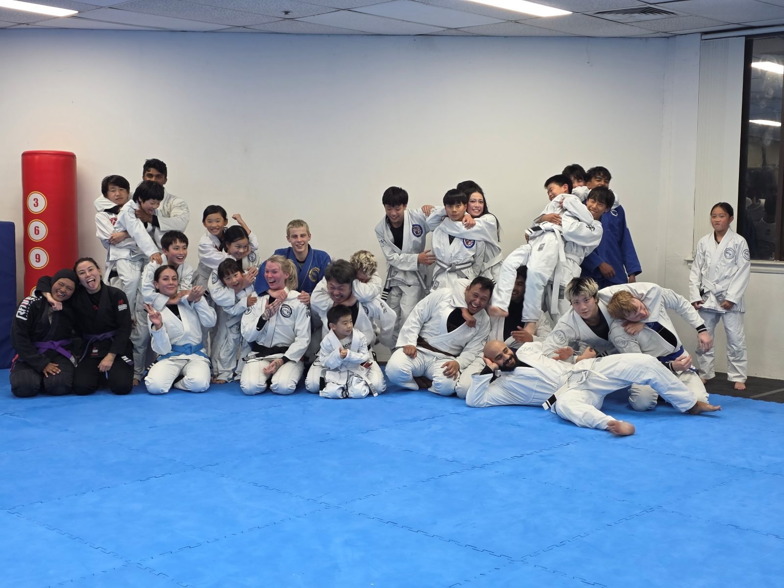 The Carlingford training room with the class lined up along the mat