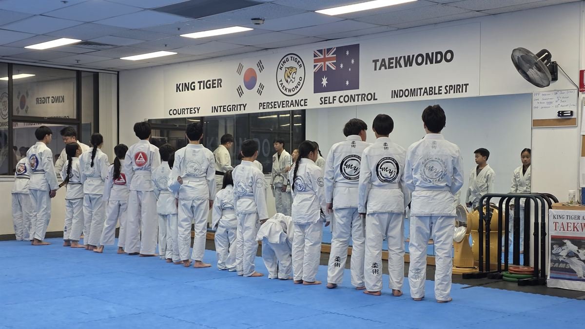 The shared Carlingford training hall, with King Tiger Taekwondo signage on the wall